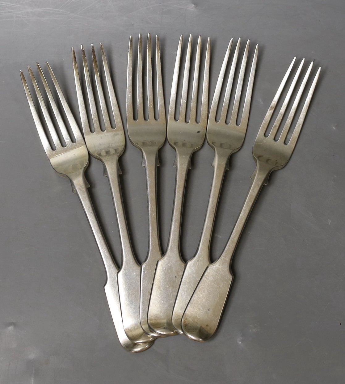 A set of six George IV silver fiddle pattern table forks, William Eaton, London, 1829, 14.5oz.